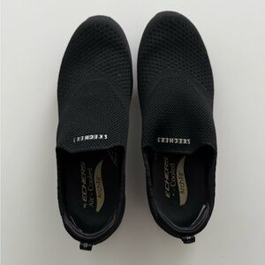 Skechers Women’s Black Arch Fit Slip-On Sneakers